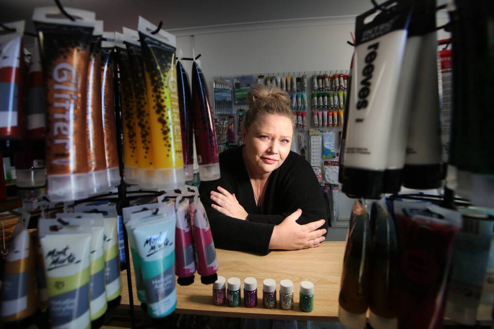 COVID SUCCESS STORY: Karen Wickham has opened Fluid Art Supplies at Albion Park Rail, selling products used to pour and flow across a canvas to create abstract art. Picture: Sylvia Liber