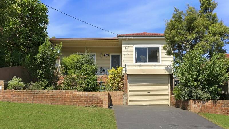 FAMILY HOME: The property is three kilometres from Wollongong CBD, close to schools and freeway, with two living areas and solar panels. Picture: First National