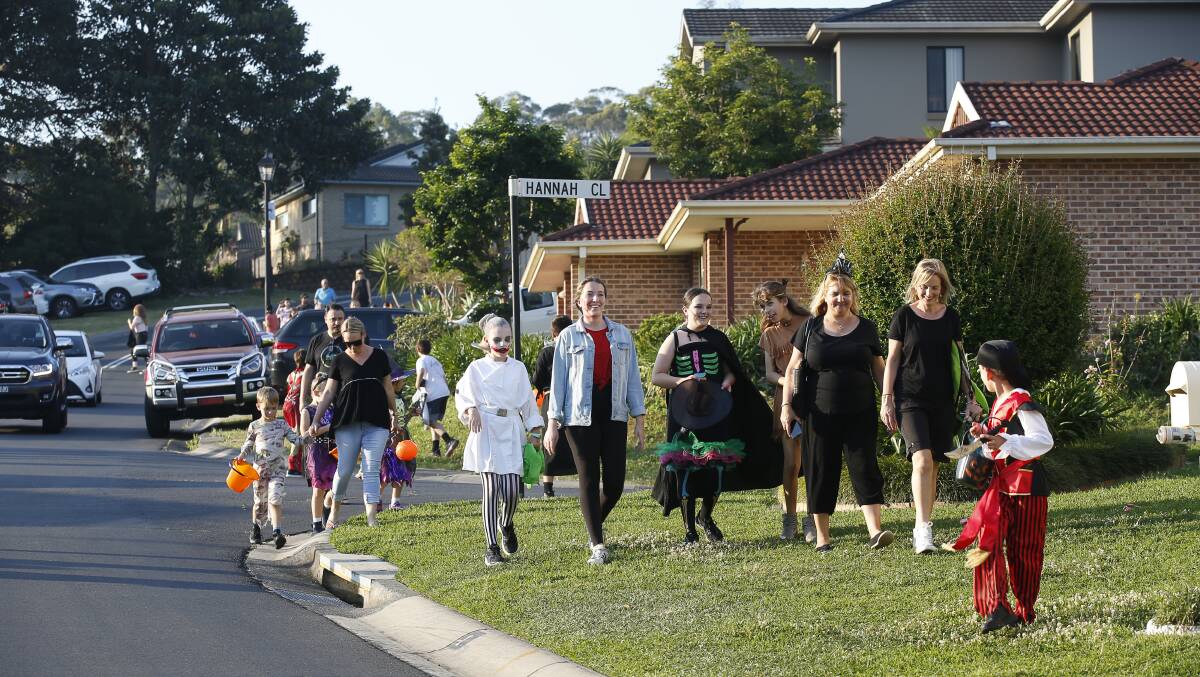 People trick or treating in 2019, at Darragh Drive and Hannah Close in Figtree. Picture: Anna Warr