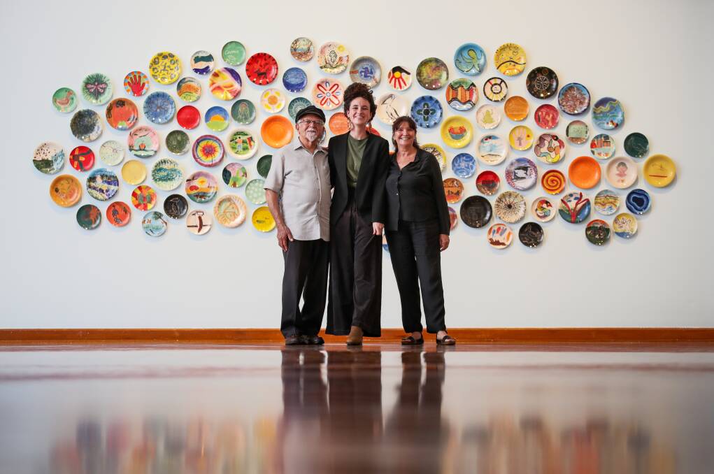 Curator Tess Allas and assistant curator Alinta Maguire with Uncle Vic Chapman at the Wollongong Art Gallery exhibition Coomaditchie: The Art of Place. Picture by Adam McLean.