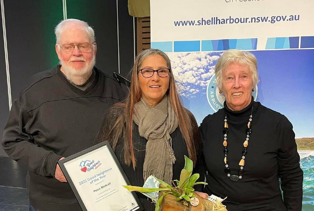 Petra Medcalf (middle) was named Shellharbour's 2022 Good Neighbour of the year. Her
neighbours nominated her for being "a living treasure ... and such a caring and loving person". Picture: Supplied