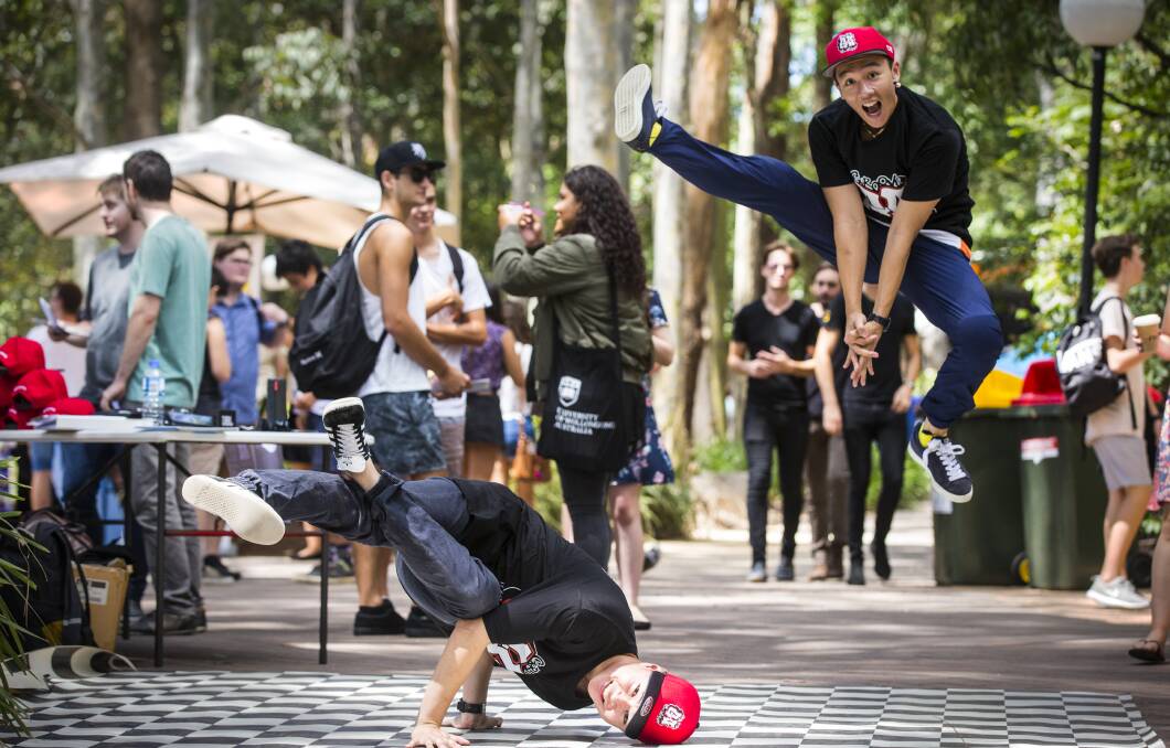 STUDY HARD: UOW's Orientation Festival welcomes students with food, freebies and live music on Tuesday. Celebrations continue all week. Picture: Paul Jones/UOW
