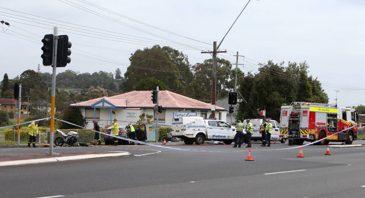 FATAL CRASH: The corner of Madigan Boulevard and Lake Entrance Road was closed for hours as crash scene investigators looked for clues. Picture: Supplied