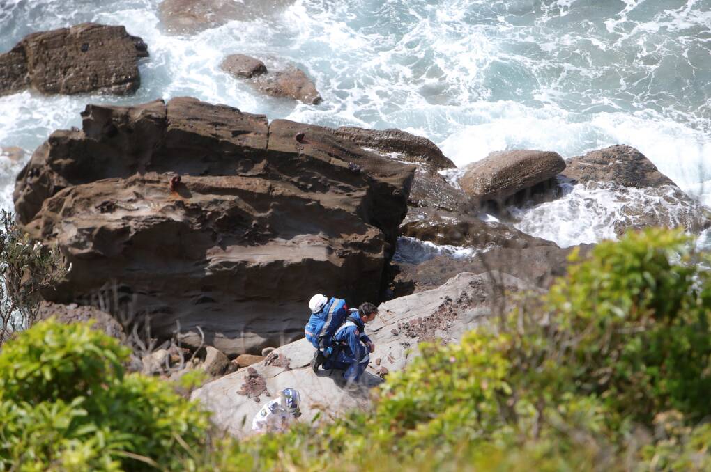 Emergency services were called to an area below the Sea Cliff Bridge on Sunday to locate a woman who suffered head injuries after slipping during a rock walk. Picture: Sylvia Liber