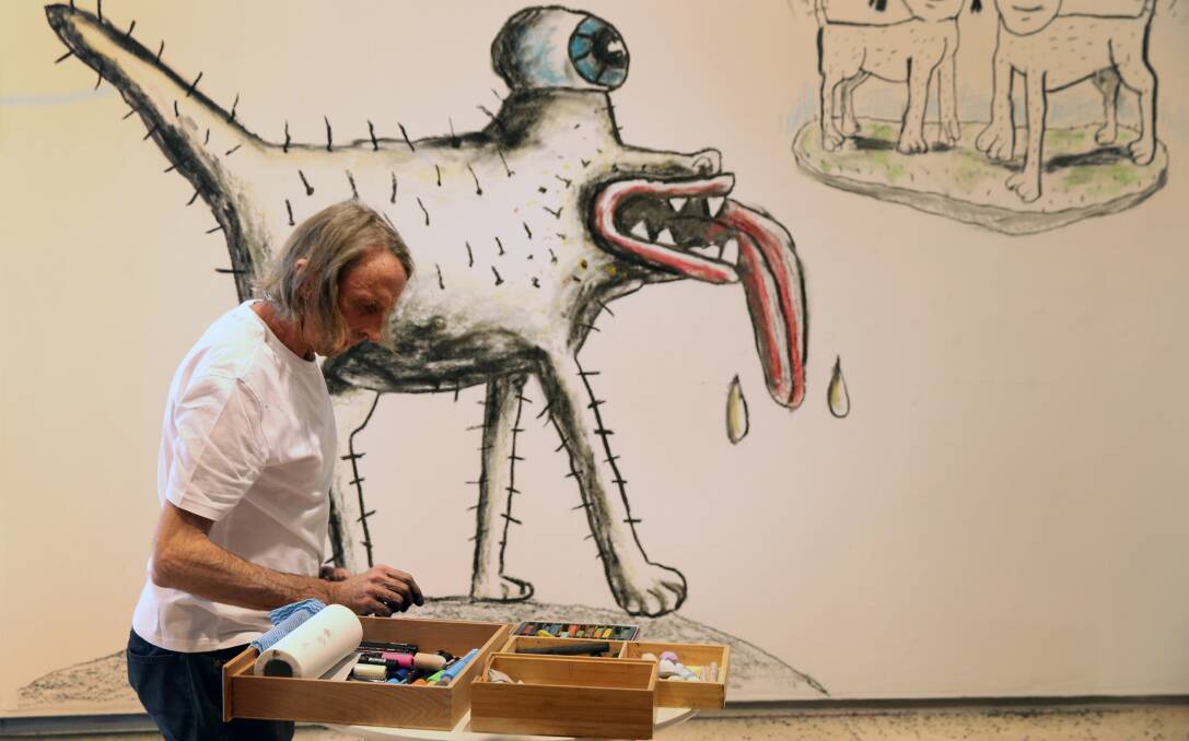 Flashback to 2015, where Reg Mombassa was doing a live drawing installation at Newcastle Art Gallery for the opening day of an exhibition. Picture by Marina Neil.