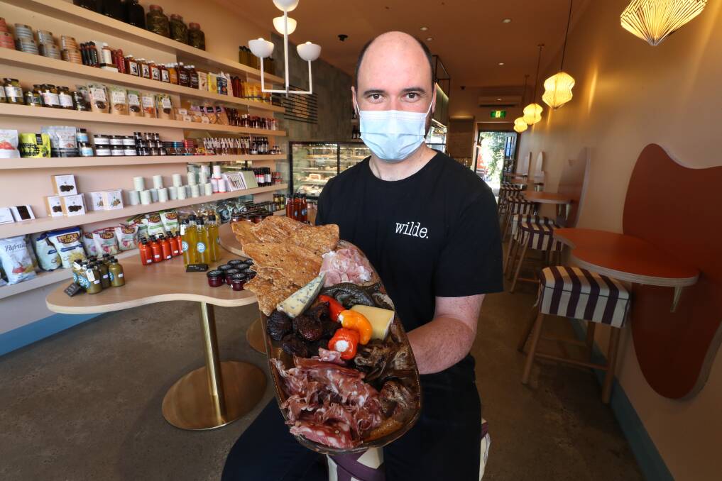 NEW VENTURE: Business has been booming for Thirroul cafe owner Jonathan Leggett who has expanded to open a deli wine bar on Lawrence Hargrave Drive, the Pickeld Poet. Picture: Robert Peet