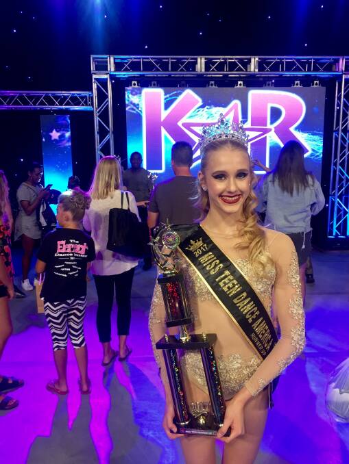 Isobel Kinnear with her trophy at the Kids Artistic Revue in Las Vegas in July. Picture: Supplied