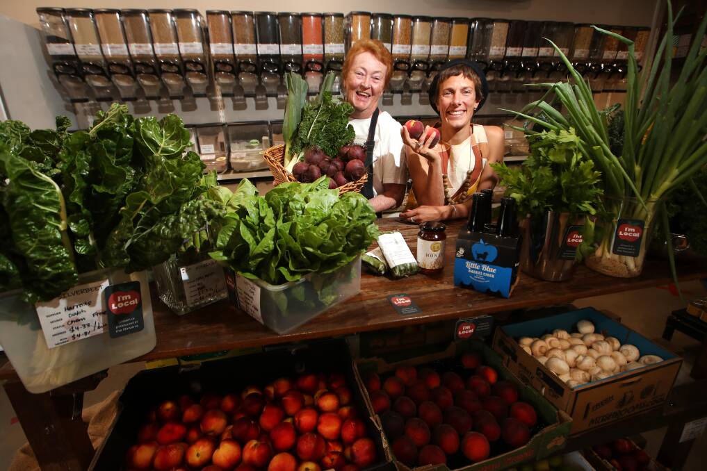 Berbel Franse from Food Fairness Illawarra with plenty of Illawarra grown goods at Thirroul's Flame Tree Co-Op with Francis Mewett. Picture: Sylvia Liber