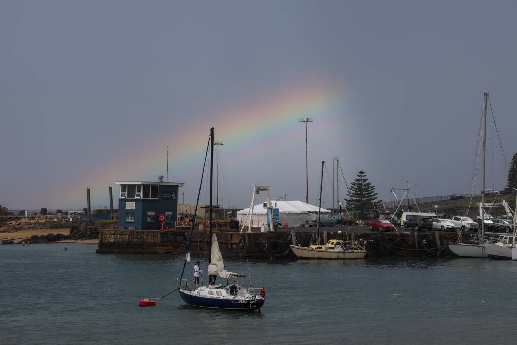 A rainbow appears over Wollongong Harbour on January 26 this year. Picture by Wesley Lonergan.