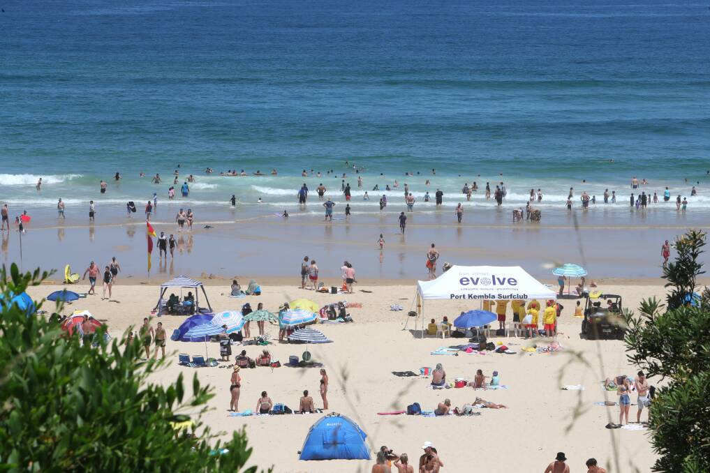 Crowds at Port Kembla Beach on Monday, where multiple rescues were made by Surf Life Savers. Picture: Sylvia Liber