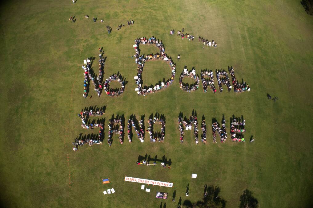 Hundreds send a message - plain and clear - regarding how they feel about a new sand mine near the banks of the Minnamurra River. Picture: Dan Reid