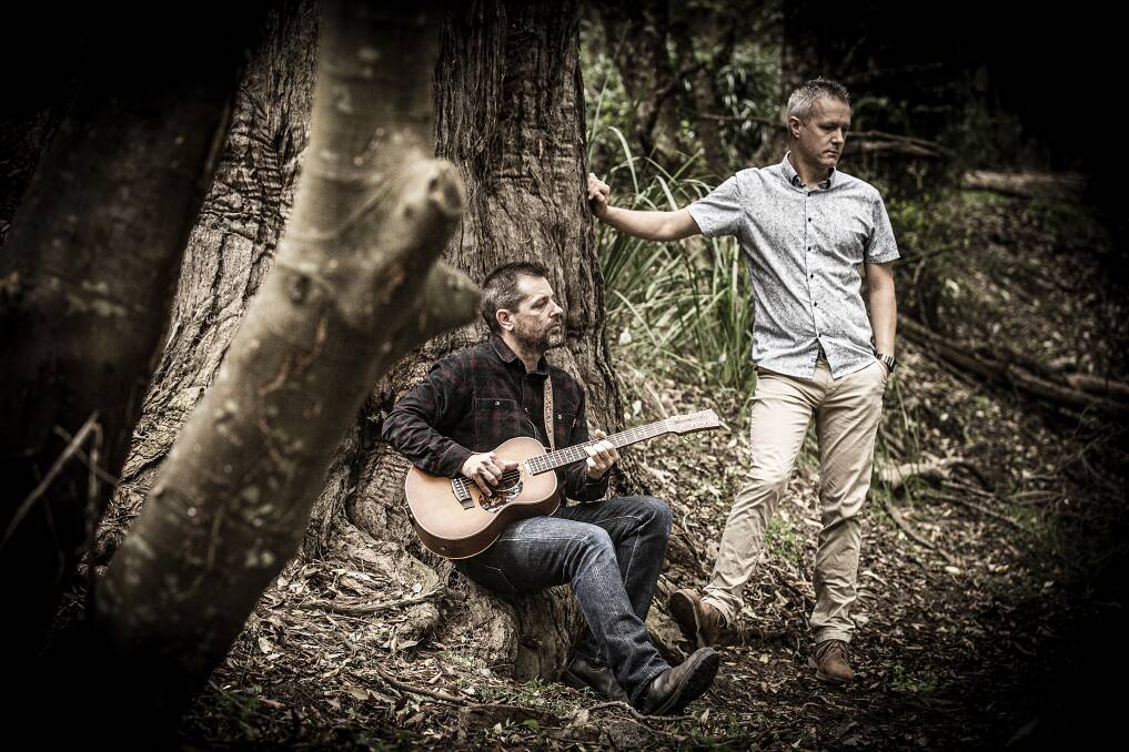 University of Wollongong researchers Chris Gibson and Andrew Warren have released a "travel book" on their six-year journey, road-tripping across the world - The Guitar: Tracing the Grain Back to the Tree. Picture: Paul Jones, UOW Media