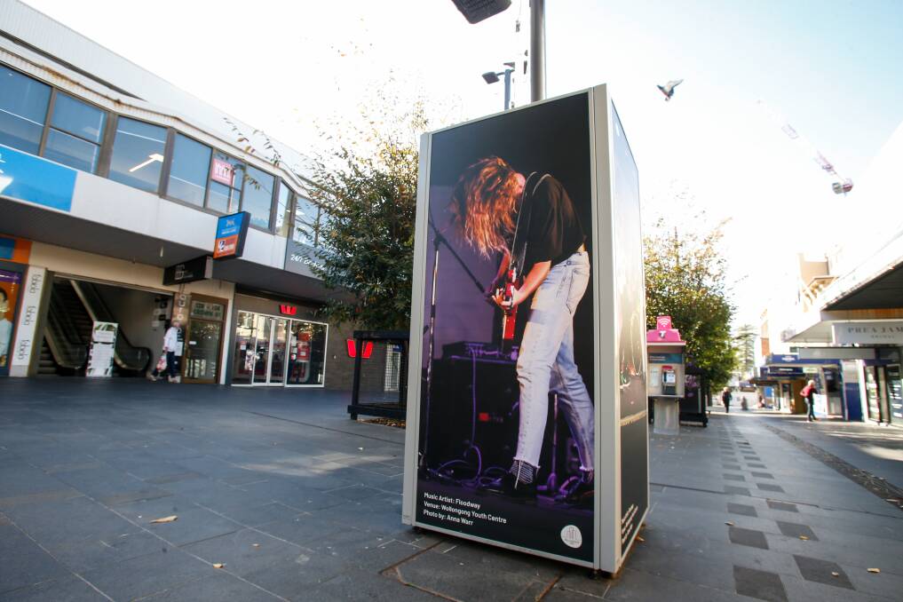 SOUND SCAPE: Illawarra music photographers Anna Warr and Chris Frape have their images showcasing live music in Wollongong CBD on display in Crown St Mall. Picture: Anna Warr