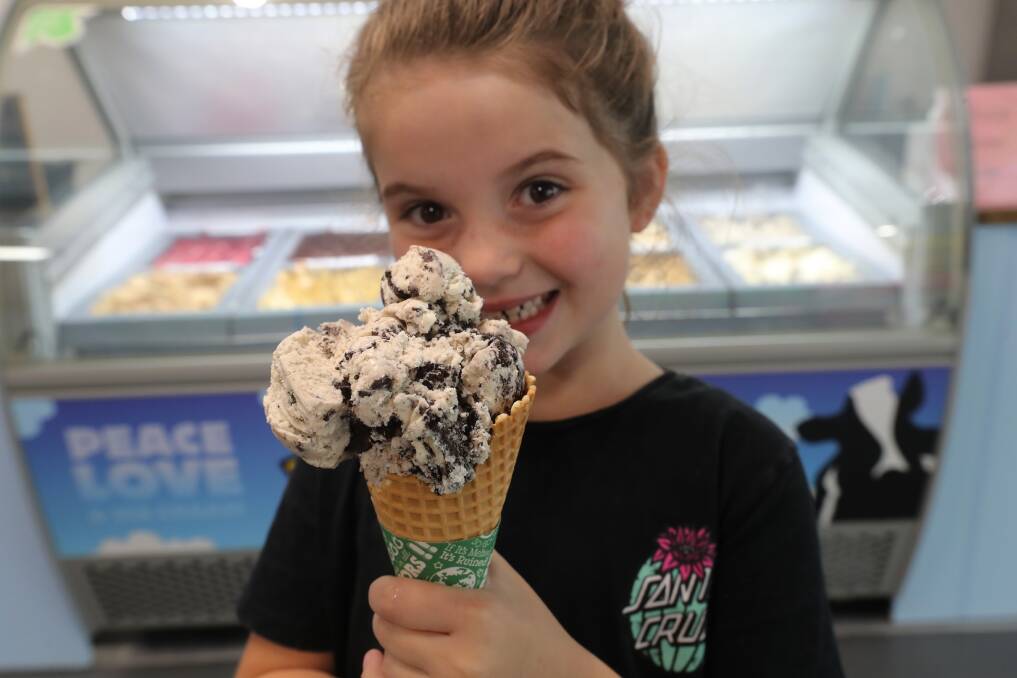 SO TASTY: Pearl Zalunardo with a giant scoop of Ben & Jerry's ice-cream at the new Lolly and Scoop Shop on lower Crown Street, which will serve free ice-cream to children this weekend. Picture: Robert Peet