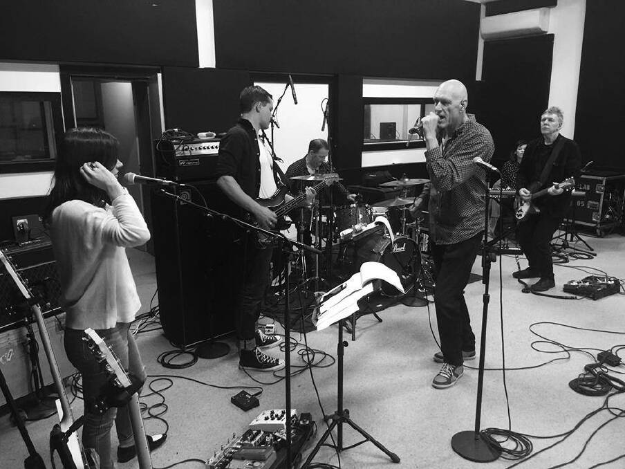 FLASHBACK: Mr Smok hopes to attract big names once more with his new venutre, like Peter Garrett and crew who are pictured at the old studios in Sydney. Picture: Facebook