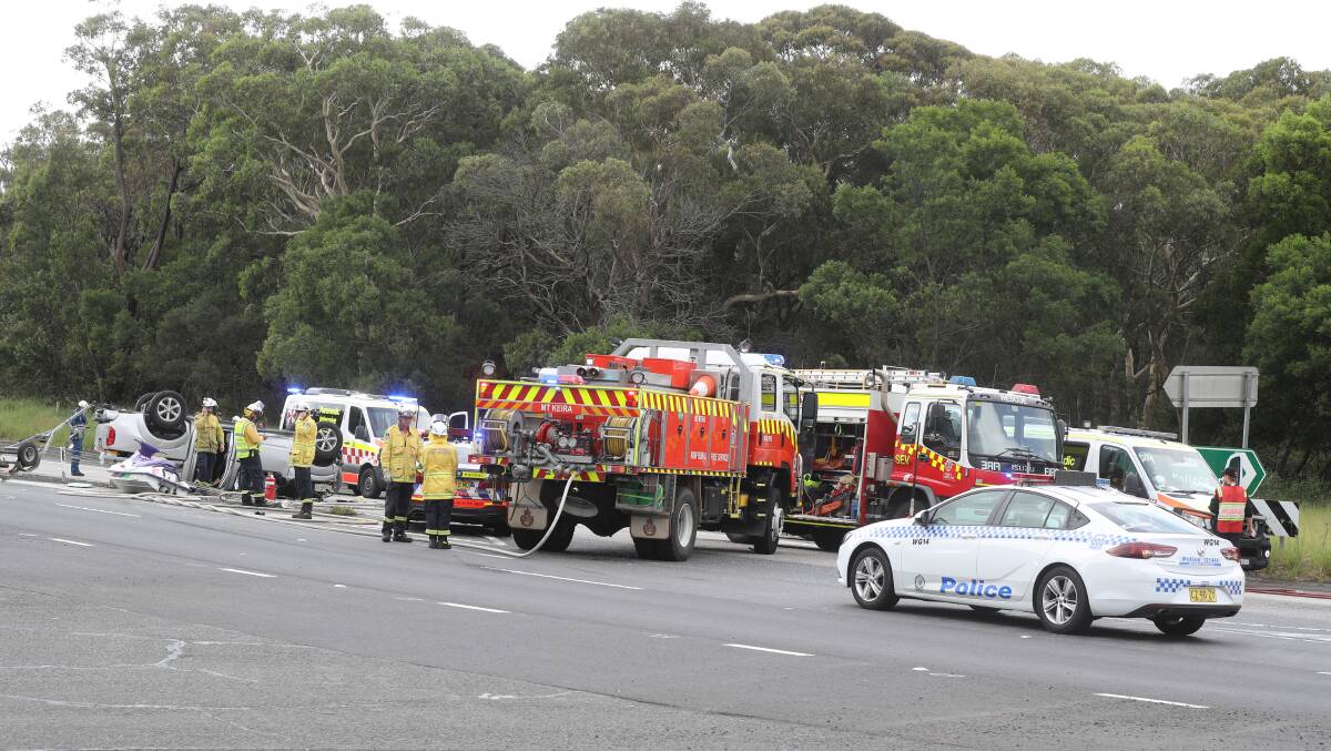 Eastbound lanes of Picton Road are closed (near the intersection of Mount Keira Road) while one westbound lane is open for traffic flow. The Transport Management Centre advises motorists to expect delays. Pictures: Robert Peet