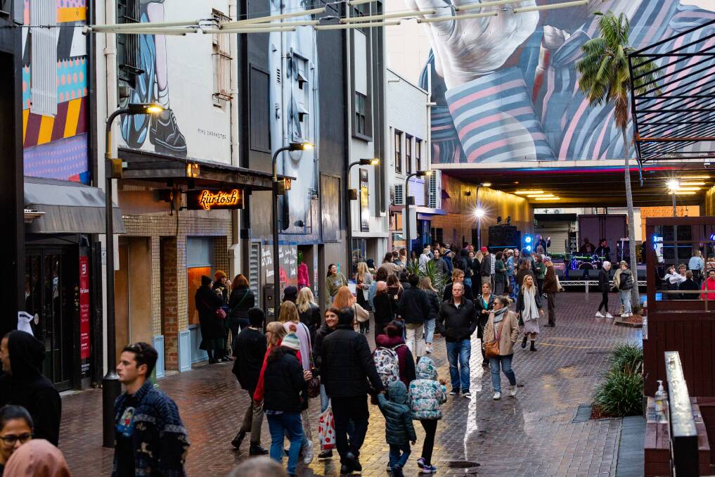 UPCOMING MAKEOVER: Globe Lane (above in pre-COVID times) is set to be jazzed up with public art, lighting, shelter, digital content, projections or anything that breathes life back into the precinct. Picture: Wollongong City Council