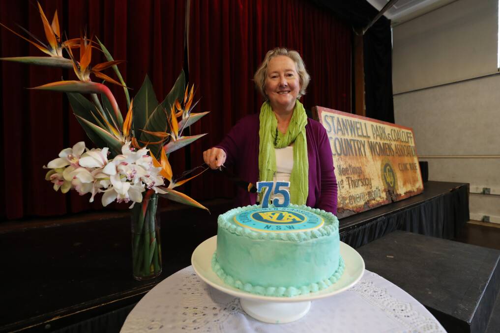Stanwell Park CWA member and maker of the anniversary cake Karen Thomas on Tuesday, as the branch celebrated 75 years. Picture: Robert Peet