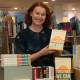 CHANGE MAKER: First-time author Claire O'Rourke with her new book Together We Can, at Collins Booksellers Thirroul. Picture: Robert Peet