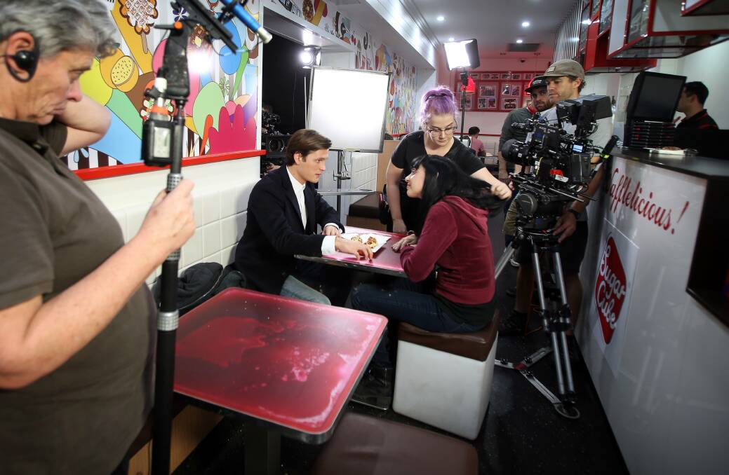 A scene from Harmony being filmed at Sugar Cube in Wollongong in August 2016. The film's synopsis is Harmony is born with an energetic power to absorb fear from others, but she must find love to balance the fears of her own and fight an ever growing storm of negative energy. Picture: Sylvia Liber