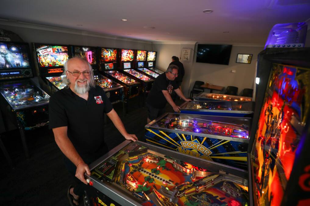Illawarra Pinball Club president Rob Rusak with Paul Soutter (treasurer) in the new pinball room at Beaton Park Tennis Club. Picture by Adam McLean.