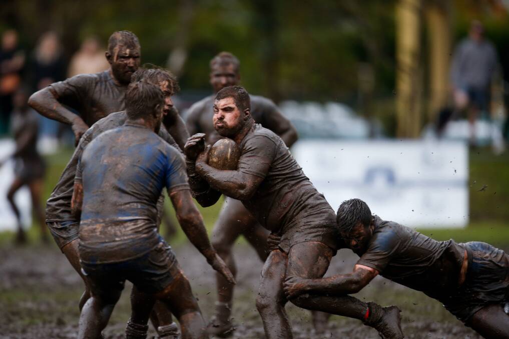 GLORIOUS MUD: Gibson Park in Thirroul turned to mush on Saturday during the Thirroul Butchers v Collegians Illawarra League game. Picture: Anna Warr