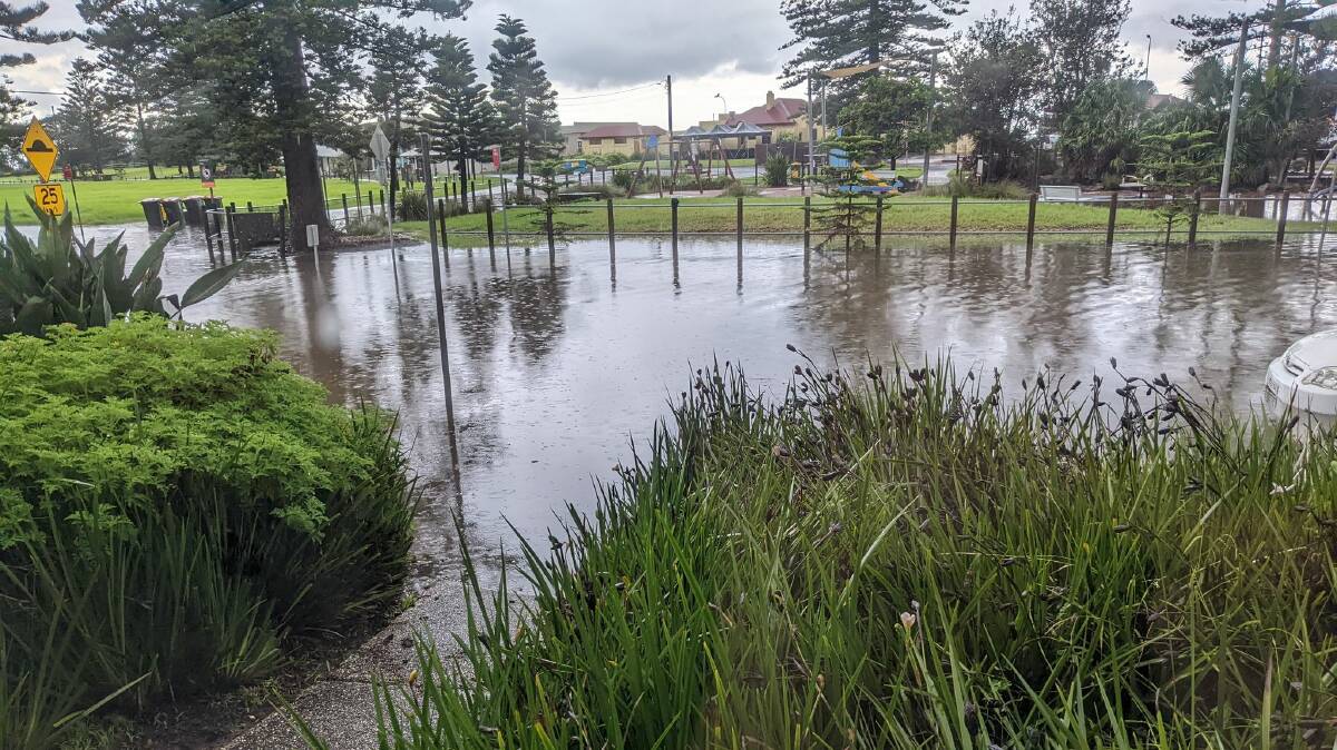 The Esplanade in Thirroul on Saturday morning after heavy rain brought flash flooding. Picture: Supplied
