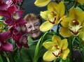 FLASHBACK: Helen Williams of Kanahooka with some of the beautiful blooms on display in 2012. Picture: ACM File Image