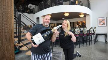 Michael Graham and Sharon Arrow on Monday in the soon to be opened Balthazar Champagne Bar in the Lang's Corner building on Kembla Street in Wollongong. Picture by Adam McLean