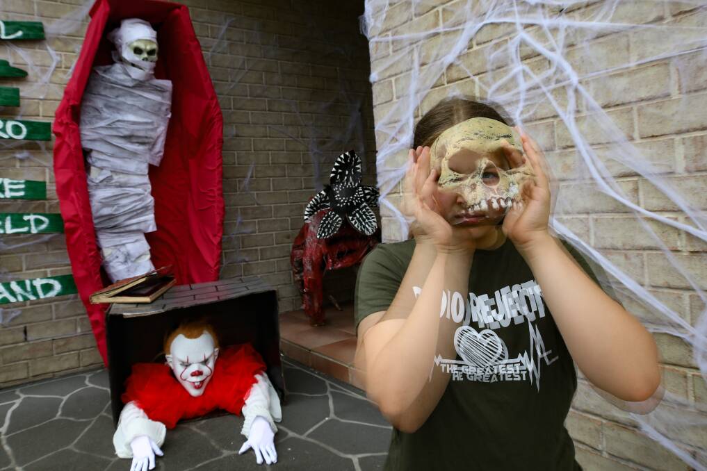 Halloween fan Amari Smith, her father Josh Smith is again planning to decorate their Port Kembla house and turn it into a horror maze for Halloween. Picture by Adam McLean