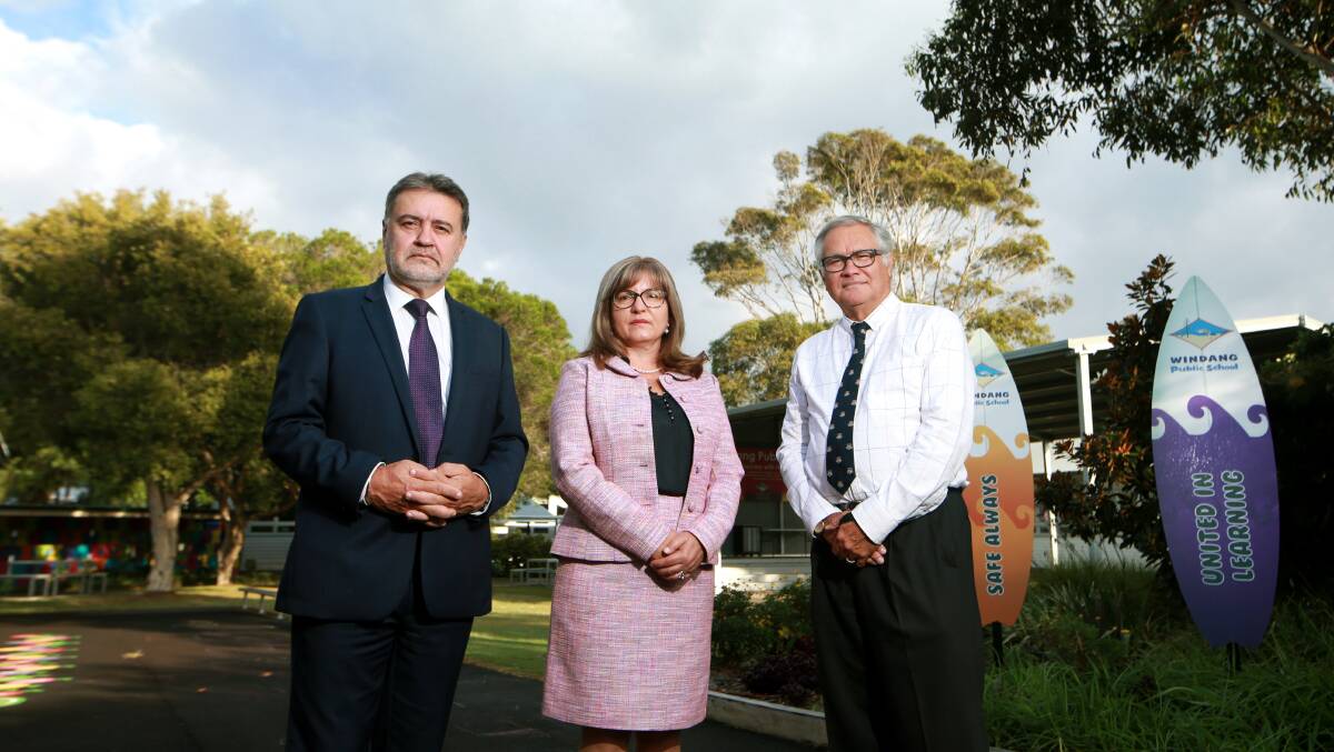 NSW Teachers Federation's Angelo Gavrielatos, Windang PS principal Loretta Kocovska and Geoff Gallop discuss an inquiry into the teachers profession on Wednesday at Windang Public School. Picture: Sylvia Liber