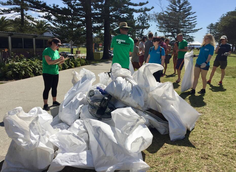 THE WEIGH STATION: Green Connect volunteers weigh up the bags of rubbish collected around North Wollongong on Saturday as part of World Cleanup Day. Picture: Desiree Savage