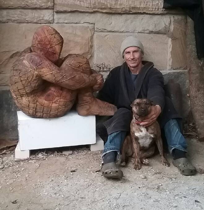 Michael Purdy and his sculpture Gimme Shelter. Picture: Supplied