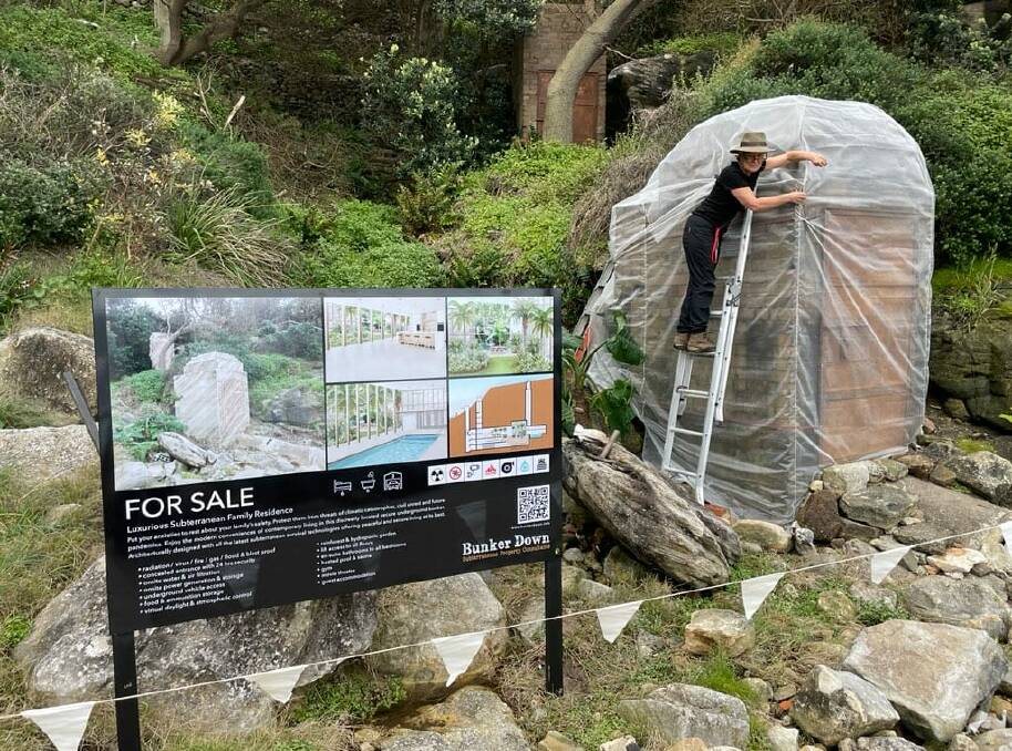 "The 'for sale' sign's just gone up and everybody thinks it's real, it's really causing a stir and everyone's confused," Kidall said while installing her work on Tuesday. Picture supplied.