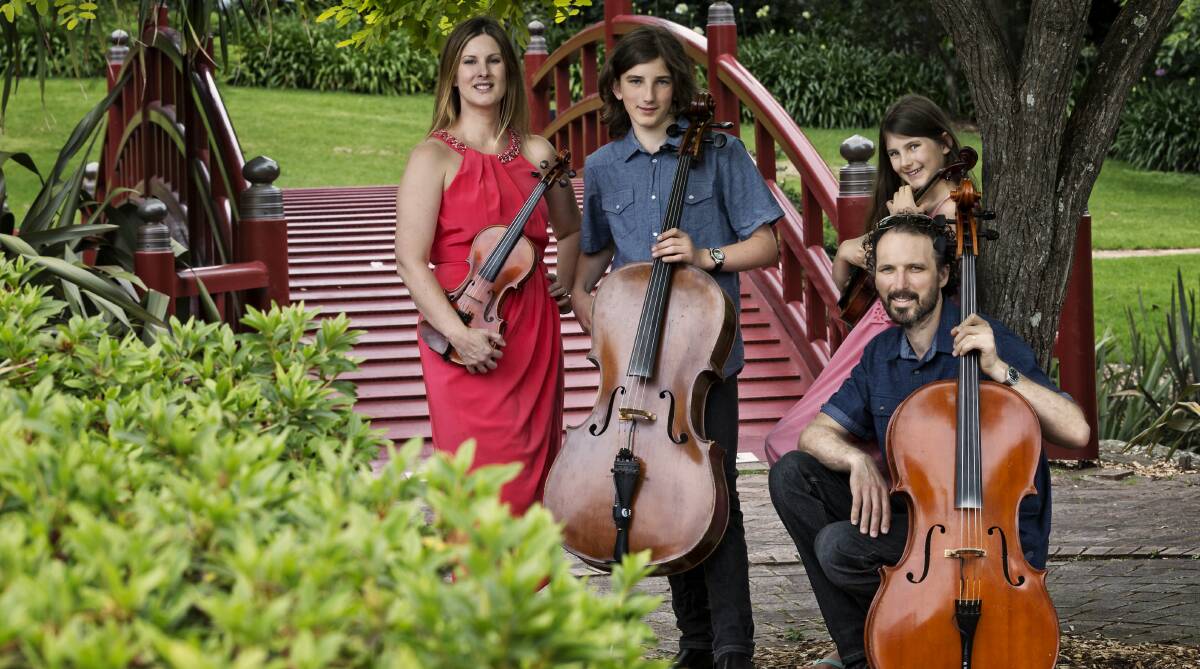 STRING FAMILY: Sarah, Heath, Joel and Ashleigh Moir are travelling around the country living off gigs and giving the kids a hands-on education. Picture: Chris Wilkins