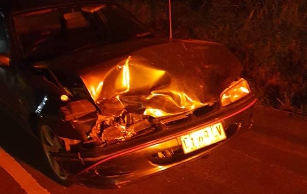 The damage to Socratis Kyriacou's Holden Commodore ute after hitting two deer on Friday morning along Memorial Drive in Wollongong. Picture: Supplied 