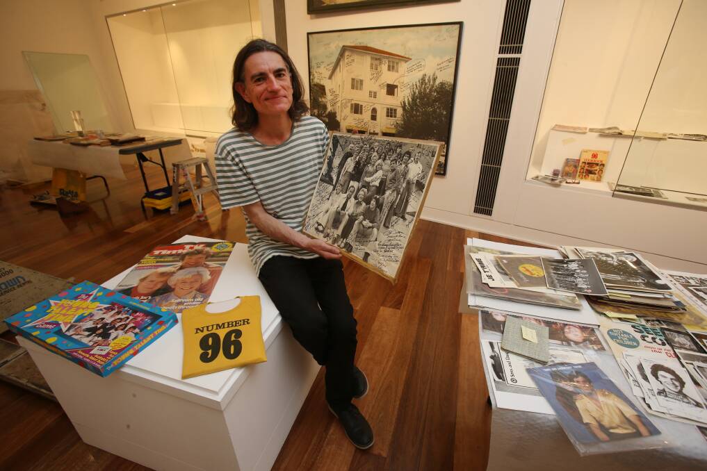 Nigel Giles with exhibits in The Box In The Corner exhibition at the Wollongong Art Gallery. Picture: Robert Peet