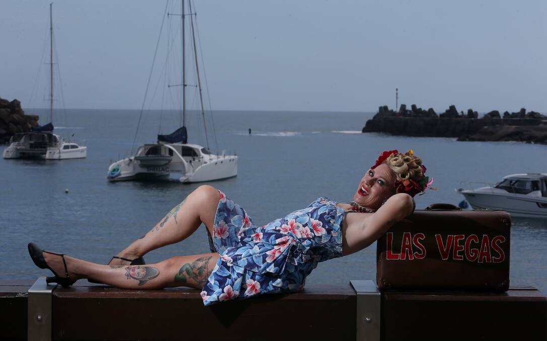 MODEL MUM: Pin-up and rockabilly is not just a fashion choice for Rachael Hutchinson, aka Miss Pearl Lee Shells, it’s a lifestyle. She wears a vintage ‘50s Royal Hawaiian Sarong Dress, typical of her own ‘tropical’ style. Picture: Robert Peet