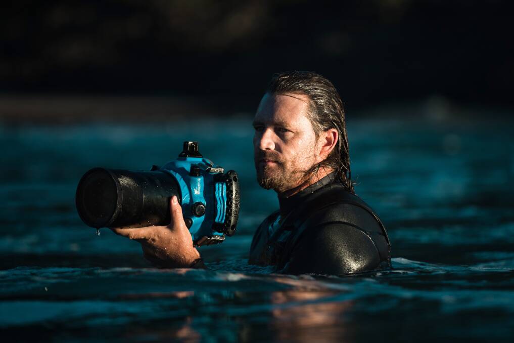 Ocean photographer Warren Keelan at work. Picture: Dave Sandford