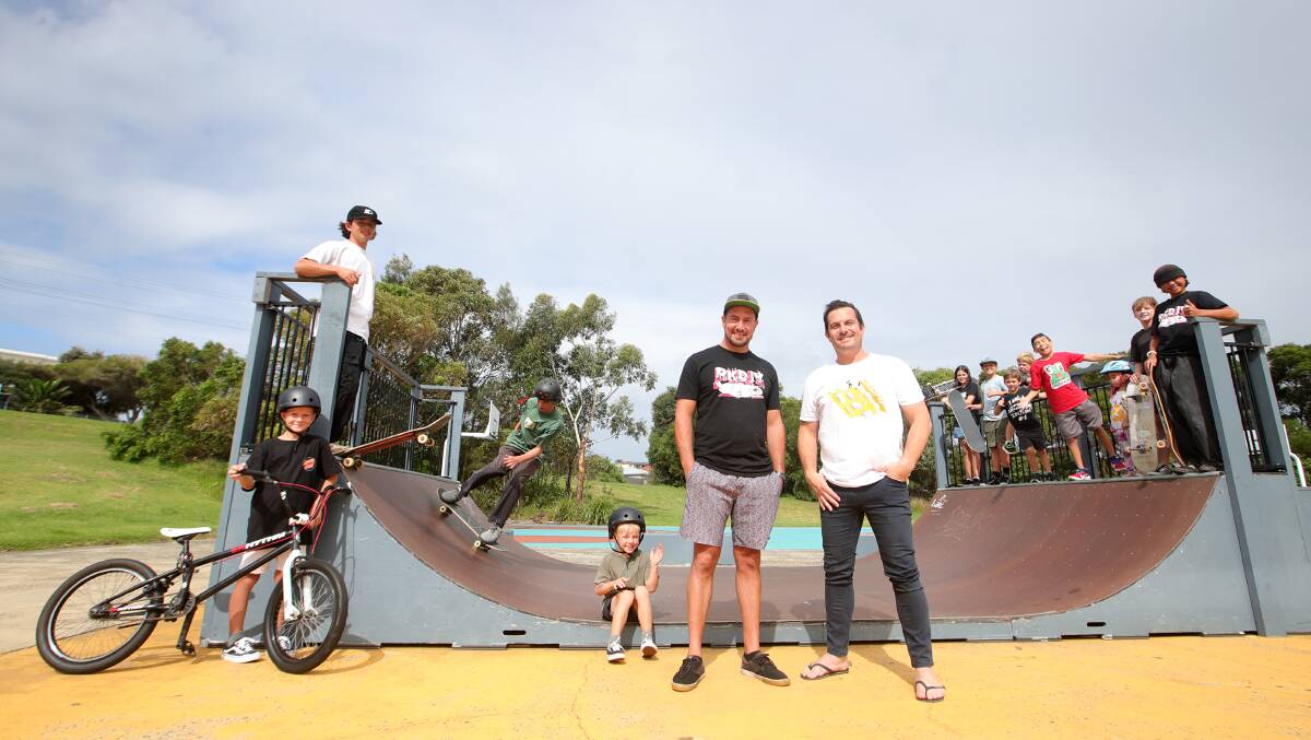 Excited kids with Will Mitry and Greg Rodgers that Port Kembla will get a permanent skate park. Picture by Sylvia Liber. 