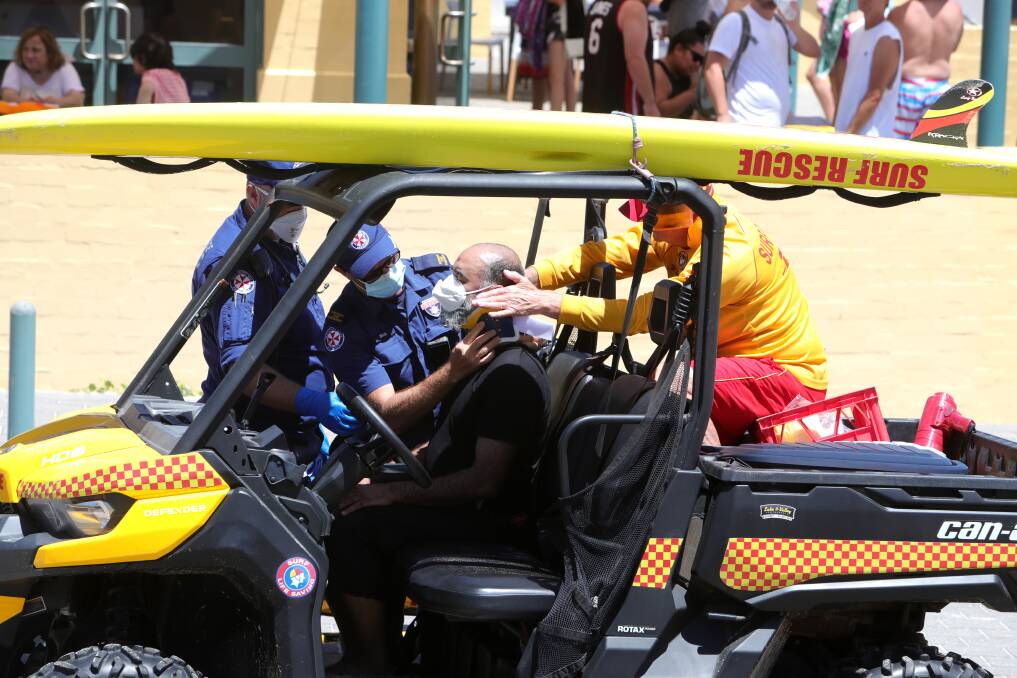 A man was treated for spinal injuries at Port Kembla Beach on Monday. Picture: Sylvia Liber