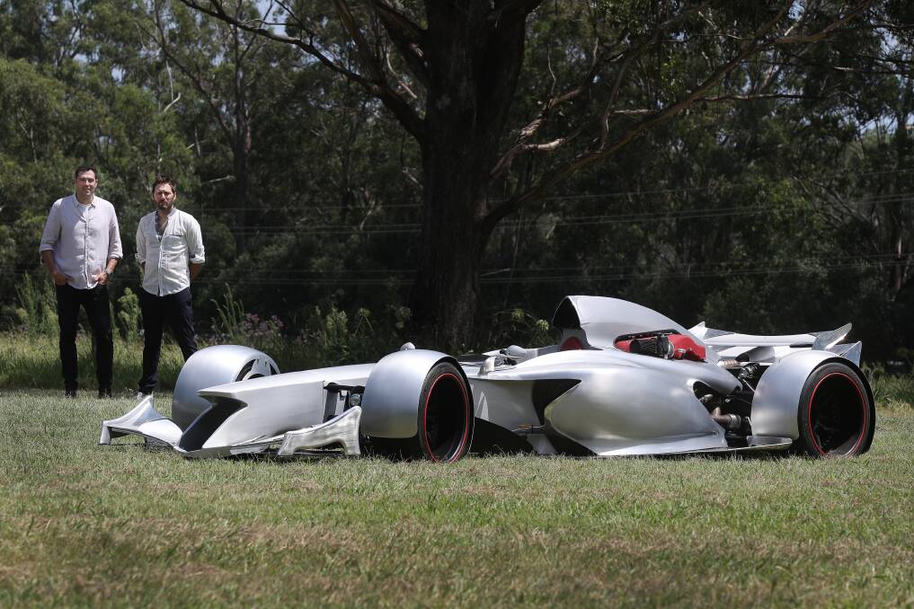 NEED FOR SPEED: Organiser of Berry Motorfair Jordan Tang and Zac Mihajlovic and his home-made custom Formula One car. Picture: Robert Peet