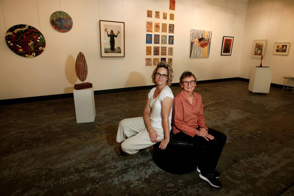 Artists Abbey Wallace and Sue Bessell at the International Womens Day Exhibition at Contemporary Artspace in Wollongong. Picture: Sylvia Liber