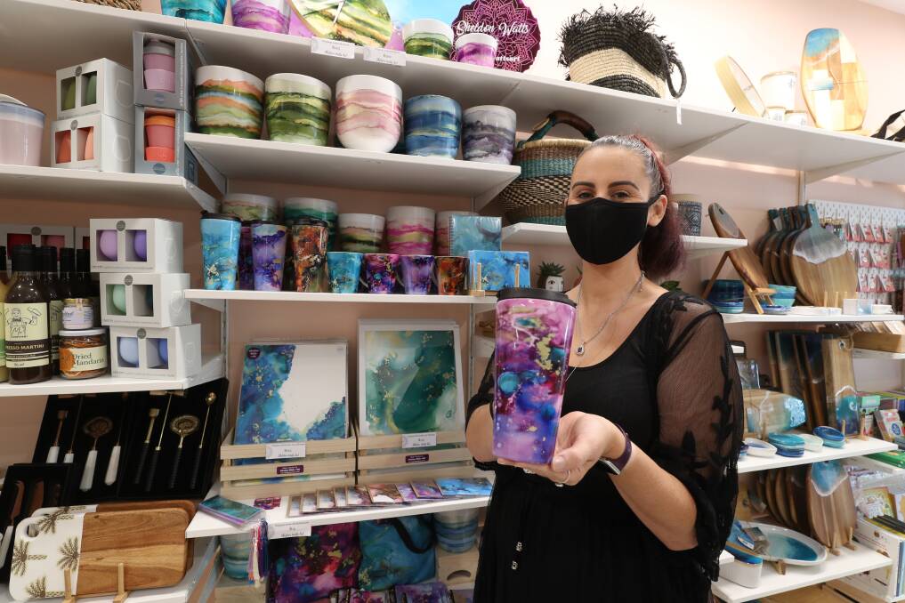 ARTISAN: Collaborator Sheldon Watts at Chatterbox in Kiama with her resin products. Picture: Robert Peet