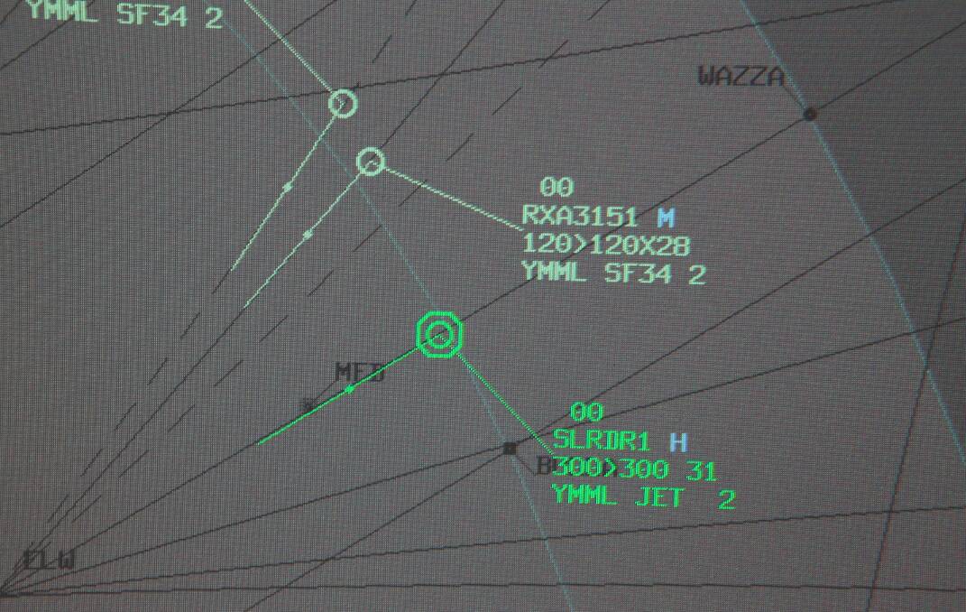The radar picture of Santa (in dark green) flying in our airspace heading to Melbourne. Santa uses the call sign ‘Sleighrider 1′, which is abbreviated on screen as ‘SLRDR1′. Picture: Airservices Australia