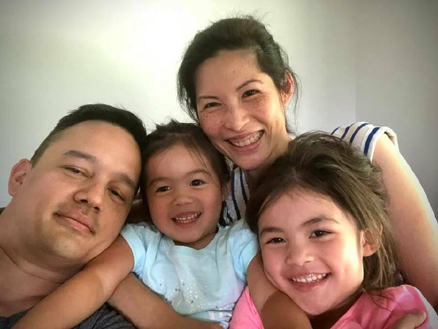 LOVING FAMILY: Adrian Waters, his wife Sharlyn Kang and their daughters Anara and Ava. Oncologist Dr Kang worked to help cancer patients and cancer research before succumbing to the illness herself. Picture: Supplied