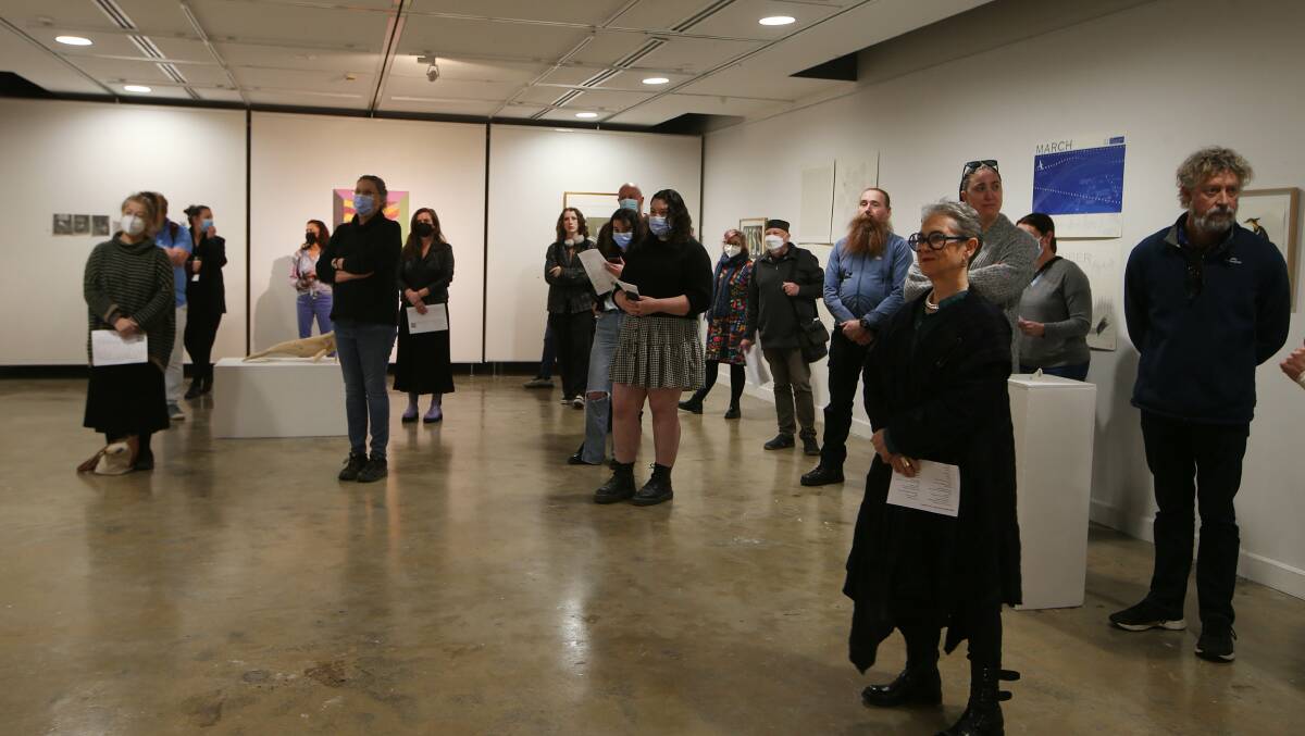 Dozens of people attended the hidden gem of UOW's Art Auction hoping to score a bargain on Tuesday. Picture: Sylvia Liber