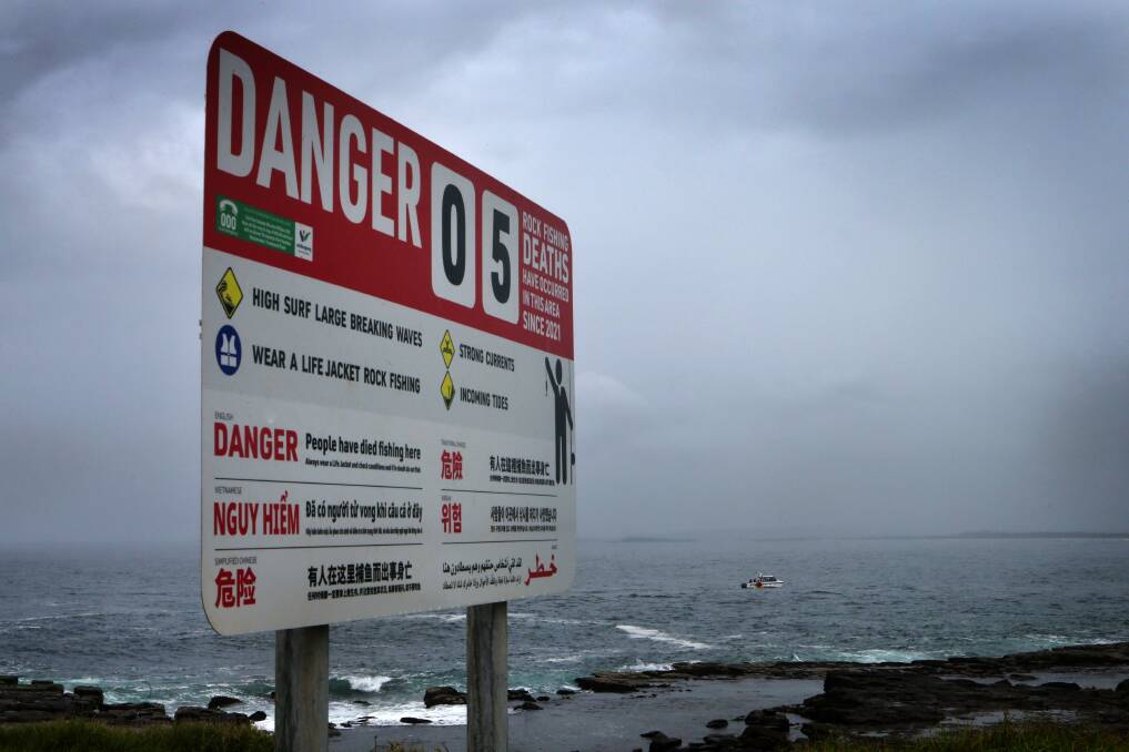 A multi-lingual sign alerts the hazards (and deaths) at Port Kembla's Hill 60. Picture: Sylvia Liber