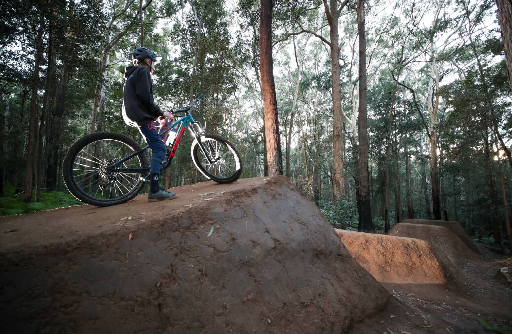 Fergus Bolack at the Possums mountain bike track in the foothill of the Illawarra escarpment at Tarrawanna, which the National Parks and Wildlife Service has originally planned to flatten. Picture: Adam McLean