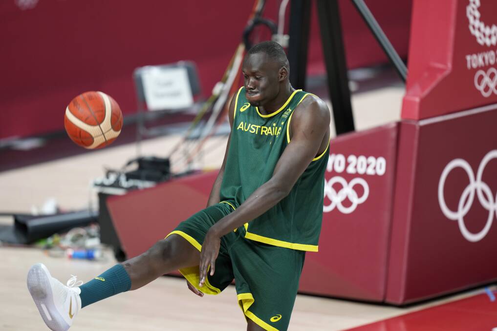 FOCUS: Hawks marquee recruit Duop Reath will need to play a bigger role for the Boomers following the withdrawal of Aron Baynes from the Tokyo campaign. Picture: AP
